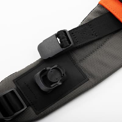 Feature focus of Step Caddy child carrier - easy use ergonomics - magnetic locking buckles